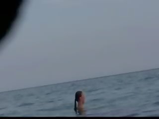 Watch A Naked Chick At The Beach Tan Her Hot Body