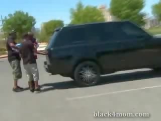 Blonde milf sucks on a ebony boner after being picked up in a parking lot